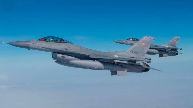 F-16 aircrafts fly during a NATO media event at an airbase in Malbork, Poland, March 21, 2023. REUTERSPIX