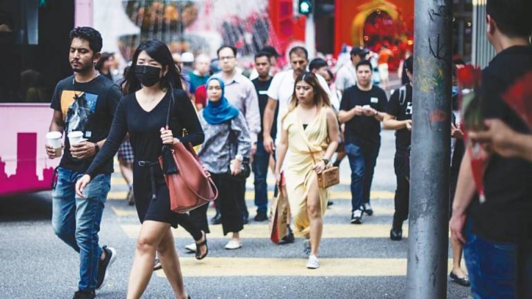 There are individuals living in Malaysia who may be simultaneously working for a Malaysian employer and a foreign employer. Picture for representational purposes only. – AFPpic