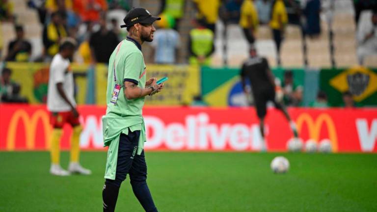 Brazil’s forward #10 Neymar checks out the conditions on the pitch ahead of the Qatar 2022 World Cup Group G football match between Cameroon and Brazil at the Lusail Stadium in Lusail, north of Doha on December 2, 2022/AFPPix