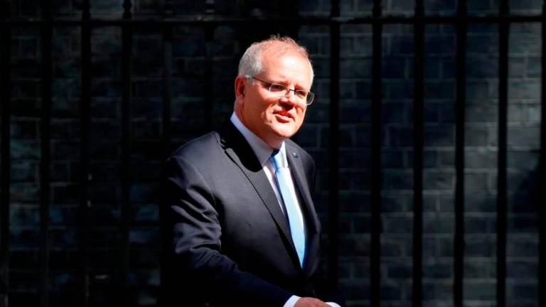 File Photo: Ex-Australian Prime Minister Scott Morrison leaves Downing Street in London, Britain, June 15, 2021/ REUTERSpix