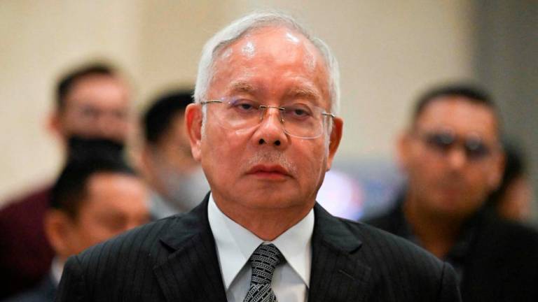 Malaysia former prime minister Najib Razak arrives for a press conference at the federal court in Putrajaya on August 16, 2022. AFPPIX