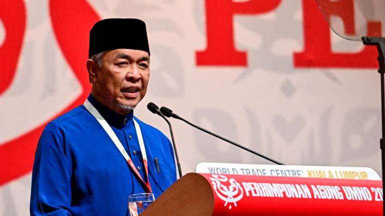 KUALA LUMPUR, 14 Jan -- Presiden Umno Datuk Seri Dr Ahmad Zahid Hamidi memberikan ucapan pengulungan pada Perhimpunan Agung Umno 2022 di Pusat Dagangan Dunia Putra (PWTC) di sini hari ini fotoBERNAMA