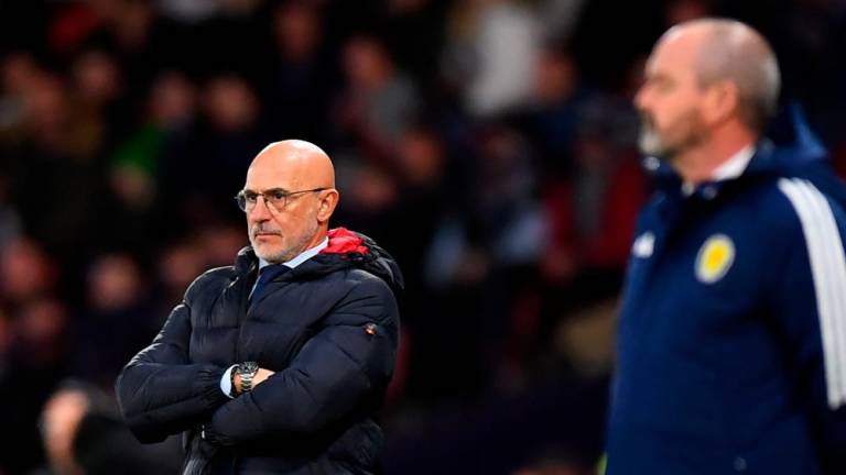 Spain’s coach Luis de la Fuente (L) and Scotland’s head coach Steve Clarke react during the UEFA Euro 2024 group A qualification football match between Scotland and Spain at Hampden Park stadium in Glasgow, on March 28, 2023. AFPPIX