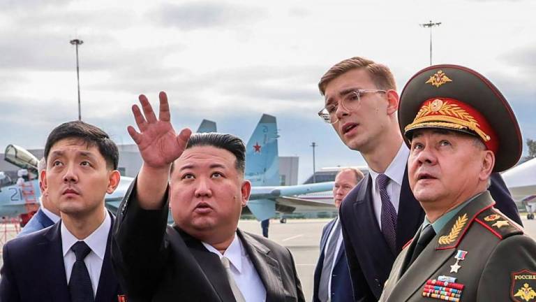 North Korea’s leader Kim Jong Un (2nd L) and Russia’s Defence Minister Sergei Shoigu (R) visit Knevichi aerodrome near Vladivostok, Primorsky region on September 16, 2023. AFPPIX
