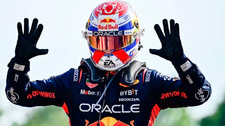 Red Bull Racing's Dutch driver Max Verstappen celebrates after winning the Italian Formula One Grand Prix race at Autodromo Nazionale Monza circuit, in Monza on September 3, 2023. AFPPIX