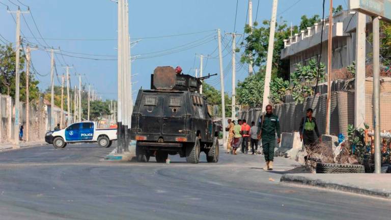 Security officers seen patrolling in Somali capital Mogadishu over attacks by Al Shabaab militants AFPPIX.