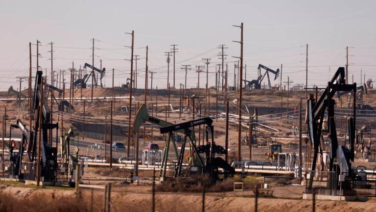 Oil derricks are seen at the Kern River oil fields, in Bakersfield, California on Jan 24. – Reuterspic