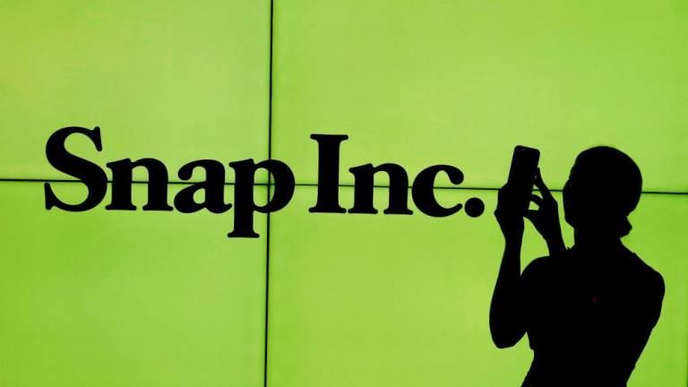 Snap says it is expecting to miss quarterly revenue and profit targets set just a month earlier and will have to slow hiring and lower spending. – Reuterspix