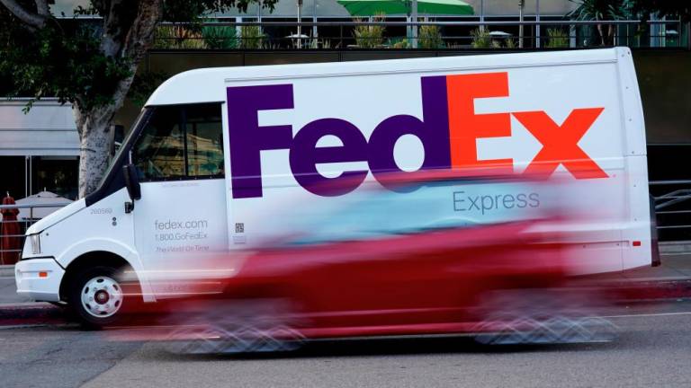 FedEx posted a higher-than-expected quarterly profit despite a drop in volume. – Reuterspic