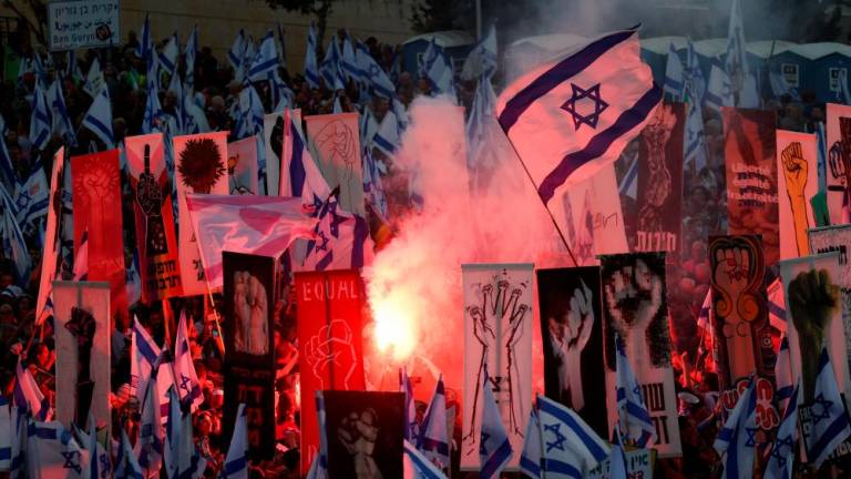 People take part in a demonstration against Israeli Prime Minister Benjamin Netanyahu and his nationalist coalition government’s judicial overhaul ahead of an appeal against an amendment that curbs some powers of the Supreme Court, in Jerusalem, September 11, 2023. REUTERSpix