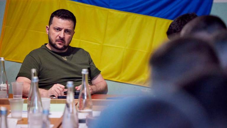 File photo: Ukraine's President Volodymyr Zelenskiy attends a meeting with local authorities during a visit to the southern city of Mykolaiv, as Russia's attack on Ukraine continues, in Ukraine June 18, 2022. Ukrainian Presidential Press Service/Handout via REUTERSpix