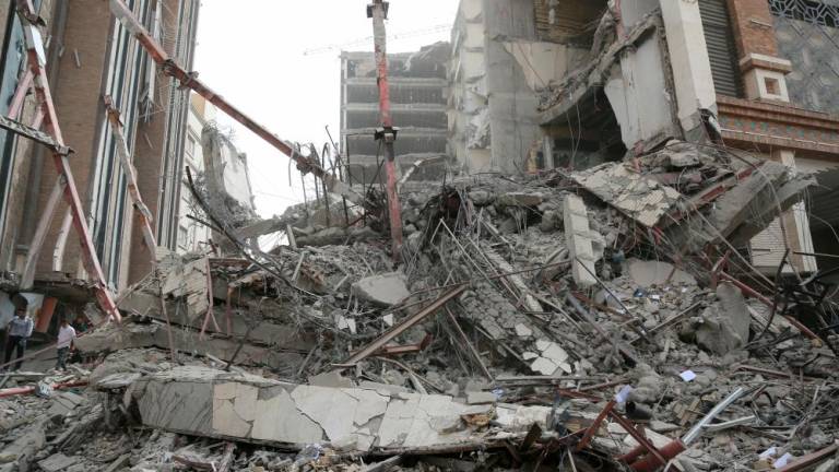 File photo: General view at the site of a ten-storey building collapse in Abadan, Iran May 23, 2022. WANA (West Asia News Agency) via REUTERSpix