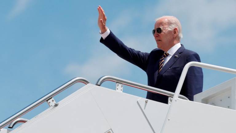 US President Joe Biden boards Air Force One to depart for his first trip to Asia as sitting president from Joint Base Andrews, Maryland, U.S. May 19, 2022. REUTERSpix