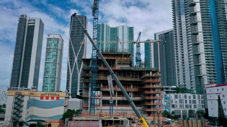 Construction cranes dot the skyline in Miami, Florida, on Monday. A US Commerce Department report shows construction spending increased 0.5% in August after rising 0.9% in July, lifted by outlays on single- and multi-family housing. – AFPpic