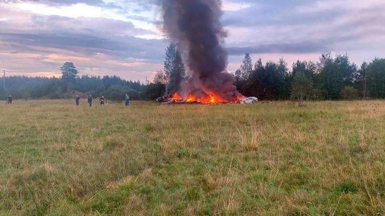 This photograph posted on a Wagner linked Telegram channel @grey_zone on August 23, 2023, that AFP was able to authenticate, reportedly shows a wreckage of a burning plane near the village of Kuzhenkino, Tver region. AFPPIX