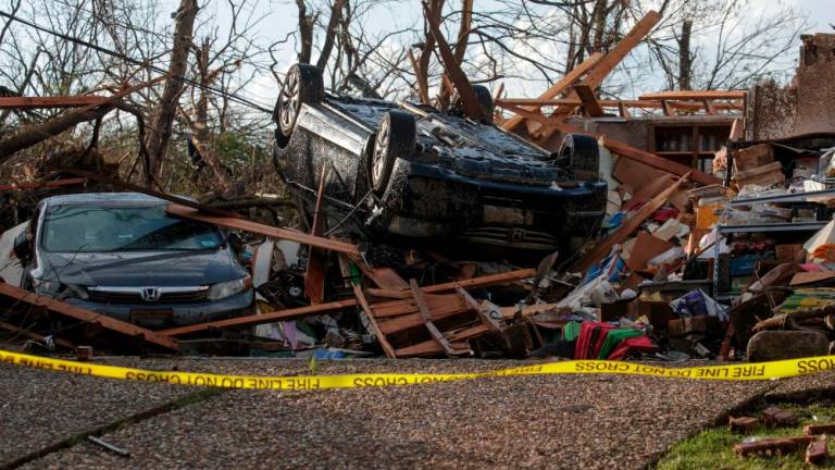 LITTLE ROCK, AR - MARCH 31: Homes damaged by a tornado are seen on March 31, 2023 in Little Rock, Arkansas. Tornados damaged hundreds of homes and buildings Friday afternoon across a large part of Central Arkansas. AFPPIX