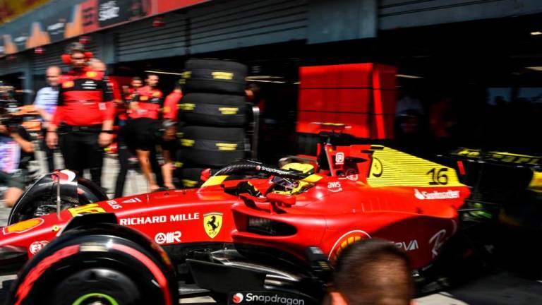 Ferrari’s Monegasque driver Charles Leclerc steers his car in the pit lane during the first practice session ahead of the Italian Formula One Grand Prix at the Autodromo Nazionale circuit in Monza on September 9, 2022. AFPPIX
