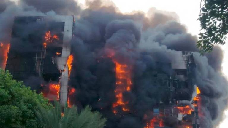 This picture taken on September 17, 2023 shows a raging fire at the Greater Nile Petroleum Oil Company Tower in Khartoum. AFPPIX