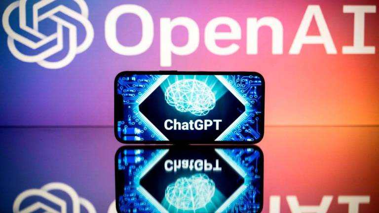 This file photo taken on January 23, 2023 in Toulouse, southwestern France, shows screens displaying the logos of OpenAI and ChatGPT. AFPPIX