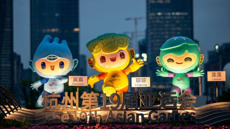 The official mascots of the 2022 Asian Games Chenchen, Congcong and Lianlian are pictured in Hangzhou, China’s eastern Zhejiang province on September 21, 2023. AFPPIX