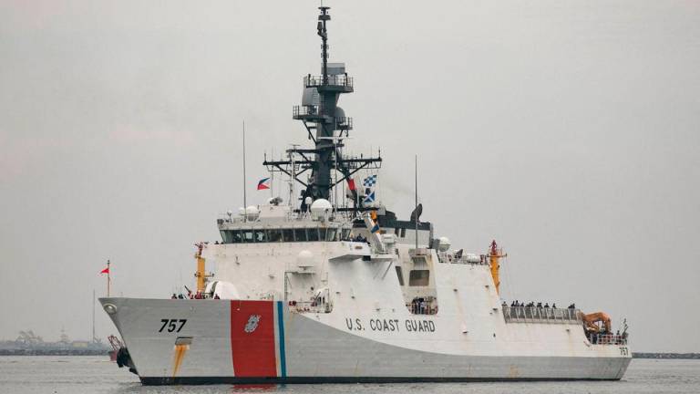 File Photo: USCG National Security Cutter Midgett arrives at a Manila port for the Philippines-U.S. joint coast guard drills, in Manila, Philippines, August 30, 2022. REUTERSPIX