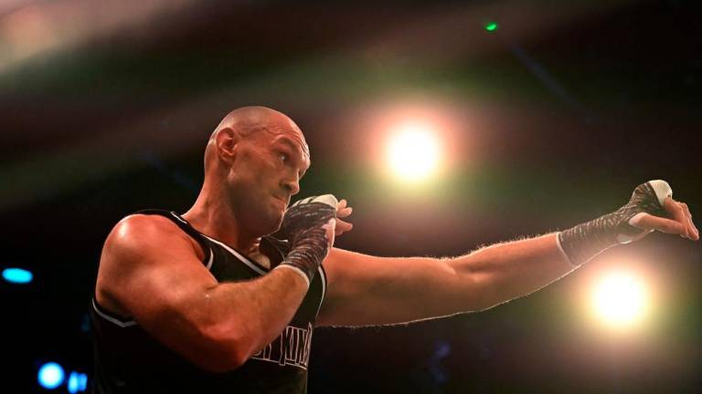 World Boxing Council (WBC) heavyweight title holder Britain’s Tyson Fury takes part in an open work-out session at the Queen Elizabeth Olympic Park in east London, on November 29, 2022. AFPPIX