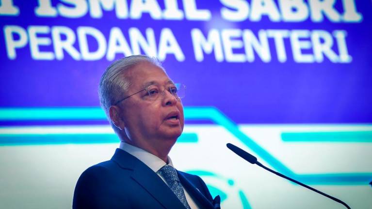 PUTRAJAYA, 1 Julai -- Perdana Menteri Datuk Seri Ismail Sabri Yaakob berucap pada majlis pelancaran Program Pembiayaan Insurans Kenderaan Keluarga Malaysia hari ini. fotoBERNAMA