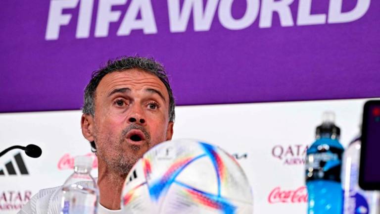 Spain's coach Luis Enrique attends a press conference at the Qatar National Convention Center (QNCC) in Doha on December 5, 2022 - AFPPIX