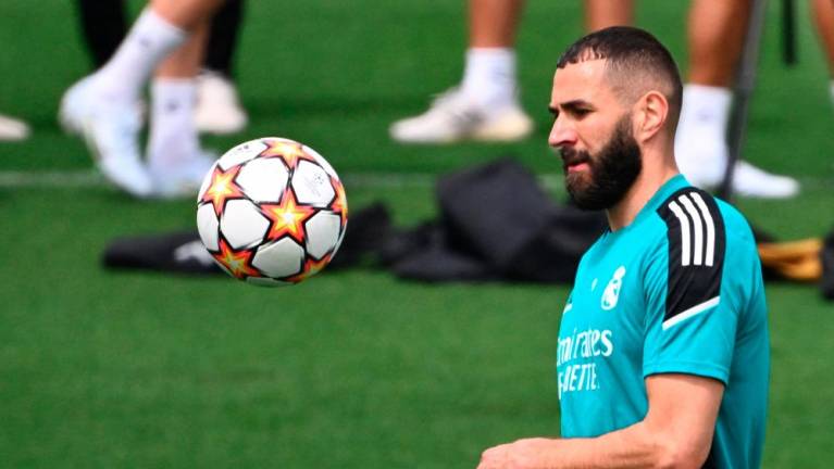 Real Madrid's French forward Karim Benzema attends a training session at the Ciudad Real Madrid in the Madrid's suburb of Valdebebas during the club's Media Day on May 24, 2022 ahead of their UEFA Champions League final match against Liverpool. AFPPIX