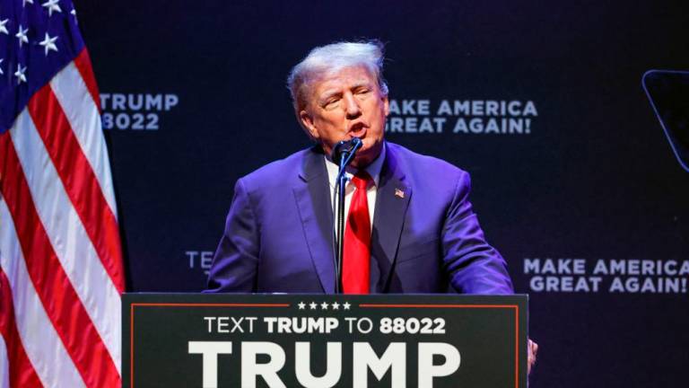 (FILES) Former US President Donald Trump speaks about education policy at the Adler Theatre in Davenport, Iowa on March 13, 2023. AFPPIX