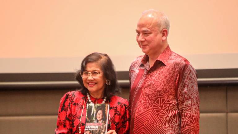 Sultan Nazrin and Rafidah at the book launch. – AMIRUL SYAFIQ/THESUN