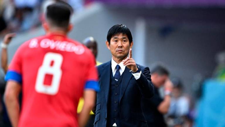 Japan’s coach #00 Hajime Moriyasu gestures on the touchline during the Qatar 2022 World Cup Group E football match between Japan and Costa Rica at the Ahmad Bin Ali Stadium in Al-Rayyan, west of Doha on November 27, 2022. AFPPIX