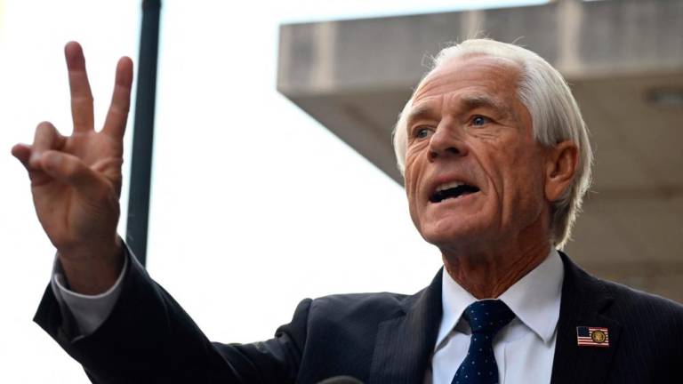 Peter Navarro, an advisor to former US President Donald Trump, speaks to members of the media at the E. Barrett Prettyman Courthouse in Washington, DC, on September 5, 2023. AFPPIX
