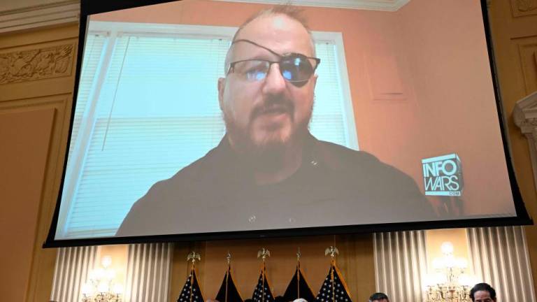 Stewart Rhodes, founder of the Oath Keepers, is seen on a screen during a House Select Committee hearing to Investigate the January 6th Attack on the US Capitol, in the Cannon House Office Building on Capitol Hill in Washington, DC on June 9, 2022/AFPPix