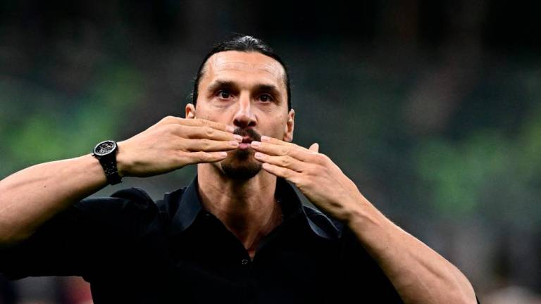 AC Milan’s Swedish forward Zlatan Ibrahimovic acknowledges the public during a farewell ceremony following the Italian Serie A football match between AC Milan and Hellas Verona on June 4, 2023 at the San Siro stadium in Milan/AFPPix