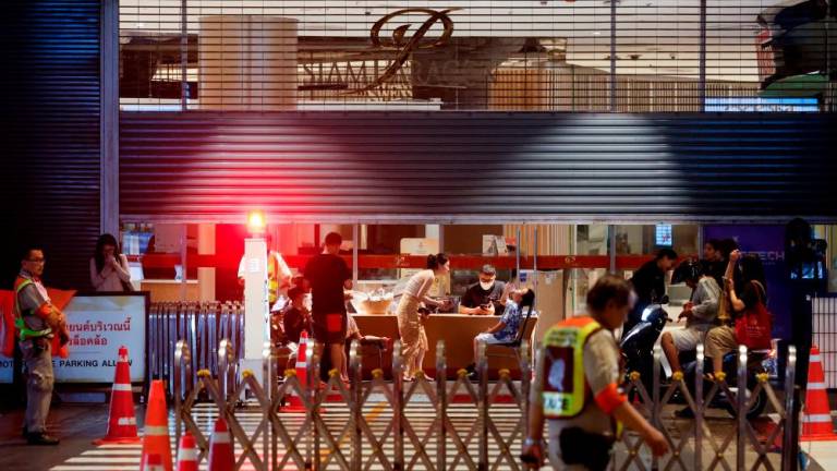 A general view shows the outside of the luxury Siam Paragon shopping mall after Thai police arrested a teenage gunman who is suspected of killing foreigners and wounding other people in a shooting spree, in Bangkok, Thailand, October 3, 2023/REUTERSPix