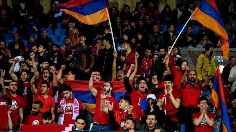 Armenia fans cheer prior to the UEFA Euro 2024 qualification football match between Armenia and Turkey at Yerevan’s Vazgen Sargsyan Republican Stadium on March 25, 2023. AFPPIX