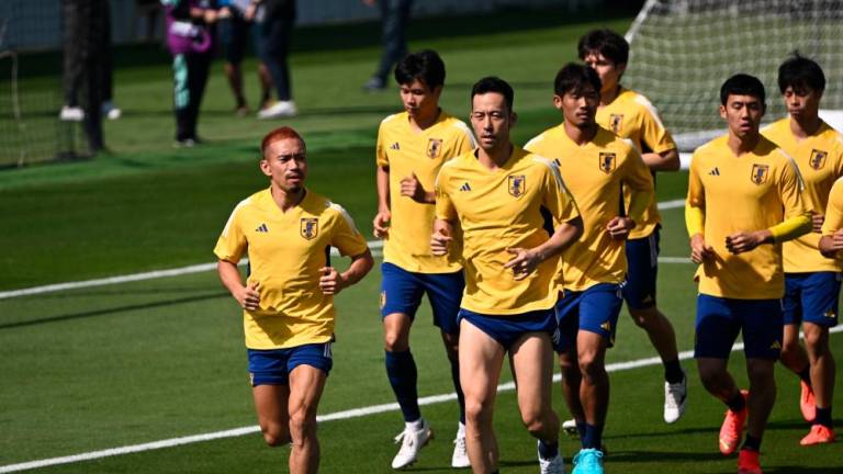 Japan’s players take part in a training session at Al Sadd SC in Doha on November 26, 2022, on the eve of the Qatar 2022 World Cup football match between Japan and Costa Rica. AFPPIX
