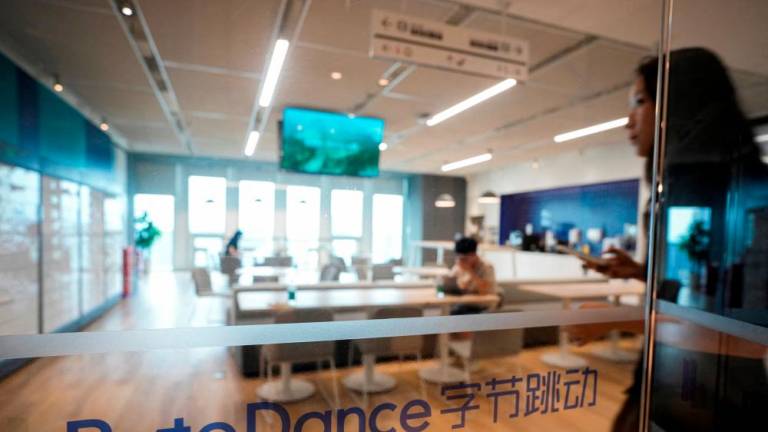 The ByteDance logo is seen at the company’s office in Shanghai. The company is looking to buy at least US$300 million worth of stock from current and former US employees, according to The Information. – Reuterspic