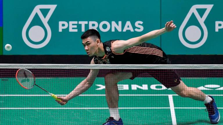 Men’s single Lee Zii Jia of Malaysia battling against his opponent Shesar Hiren Rhustavito of Indonesia in second round of the 2022 Petronas Malaysia Open Badminton Championships at Axiata Arena Bukit Jalil today. BERNAMApix
