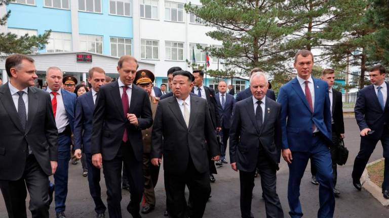 This picture taken on September 15, 2023 and released by North Korea’s official Korean Central News Agency (KCNA) on September 16, 2023 shows North Korean leader Kim Jong Un (C) visiting the Komsomolsk-on-Amur Yuri Gagarin Aviation Plant, in Komsomolsk-on-Amur, a major industrial city in the Far Eastern Region of the Russia. AFPPIX