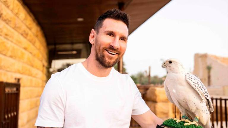 This file handout photo taken on May 01, 2023, and provided by the Saudi Tourism Authority shows Argentina’s forward Lionel Messi holding a falcon in Riyadh. Argentine superstar Lionel Messi will play in Saudi Arabia next season under a blockbuster deal, a source with knowledge of the negotiations told AFP on May 9, 2023/AFPPix