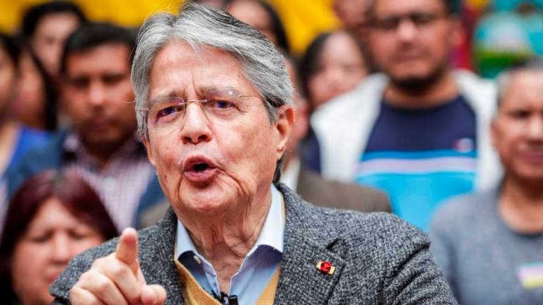 This handout picture released by the Ecuadorian Communication Secretary shows Ecuador’s President Guillermo Lasso speaking during a nationwide simultaneous TV broadcast in Quito on March 30, 2023/AFPPix