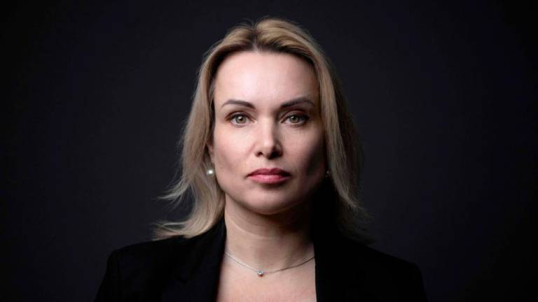 Russian journalist who protested against the invasion of Ukraine live on television Marina Ovsyannikova poses during a photo session before a press conference at “Reporters without borders” (RSF) NGO in Paris on February 10, 2023/AFPPix