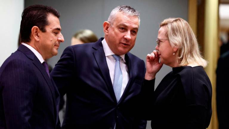Sikela (centre) speaking with Polish Minister of Climate and Environment Anna Moskwa (right) and Greek Energy Minister Konstantinos Skrekas before an extraordinary European Union energy ministers meeting in Brussels on Thursday. – AFPpic