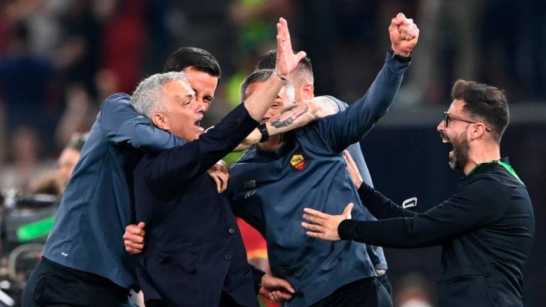Roma's Portuguese head coach Jose Mourinho and coaching staff celebrate after winning the UEFA Europa Conference League final football match between AS Roma and Feyenoord at the Air Albania Stadium in Tirana. AFPPIX