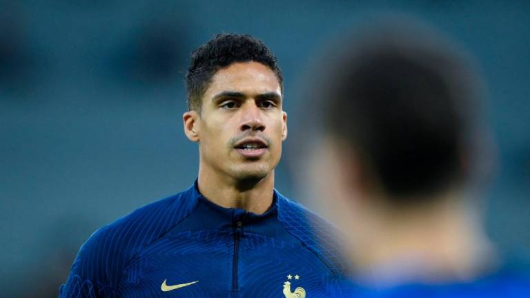 In this file photo taken on December 17, 2022 France’s defender Raphael Varane takes part in a training session at the Al Sadd SC training centre in Doha, on the eve of the Qatar 2022 World Cup football final match between Argentina and France. Varane announced on February on 2, 2023 that he puts an end to his international career at the age of 29. AFPPIX