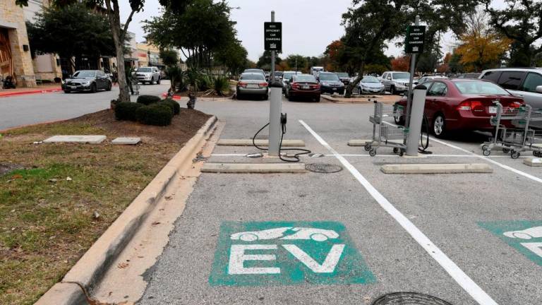 An electric vehicle fast-charging station is seen in a parking lot in Austin, Texas. The EU has concerns about a US climate law that will cut off the bloc's electric vehicles from US tax credits. – Reuterspic