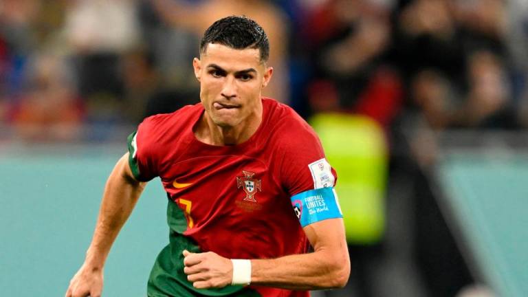 Portugal’s forward #07 Cristiano Ronaldo celebrates scoring his team’s second goal from a penalty shot during the Qatar 2022 World Cup Group H football match between Portugal and Ghana at Stadium 974 in Doha on November 24, 2022. AFPPIX