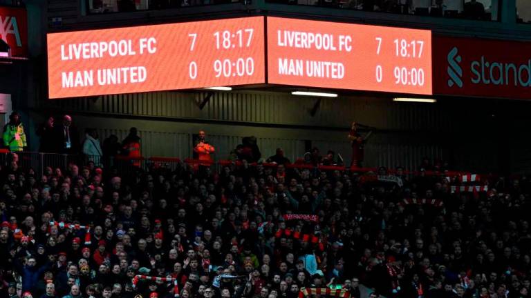 The scoreboard shows the final score, 7-0 after the English Premier League football match between Liverpool and Manchester United at Anfield in Liverpool, north west England on March 5, 2023. Liverpool won the game 7-0. AFPPIX